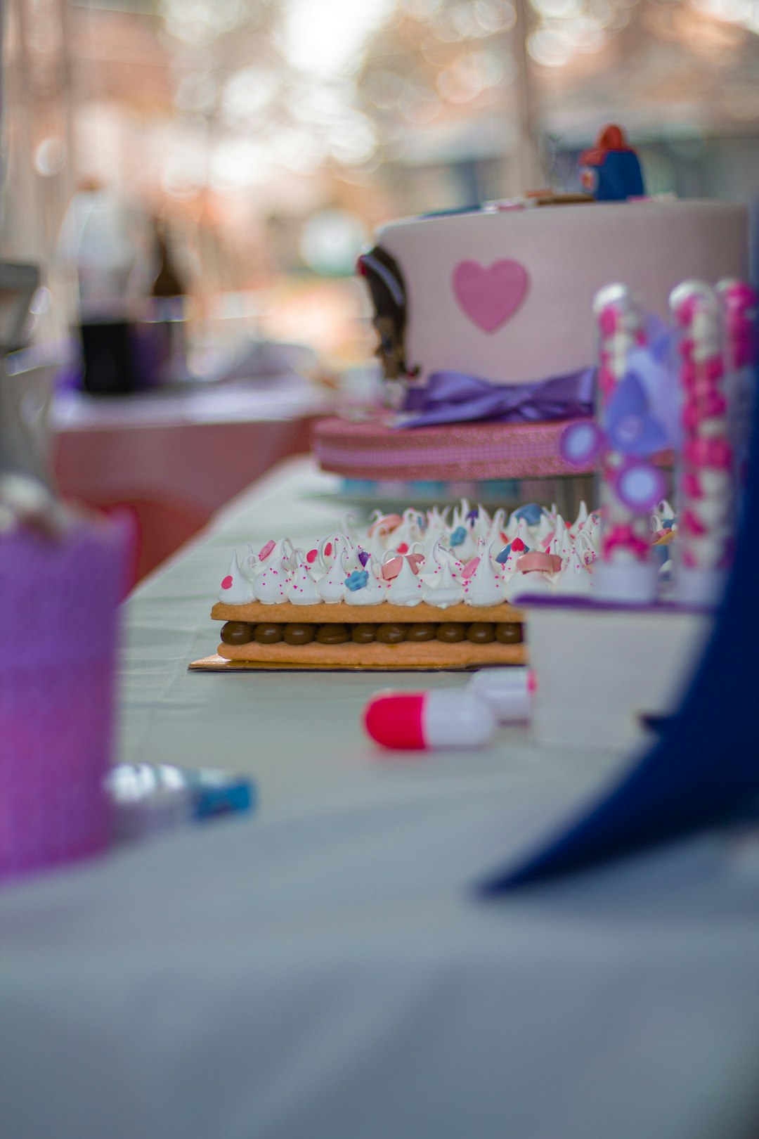 selective-focus-photography-of-cake-and-desserts-on-white-table-ih8-bm-r2pe